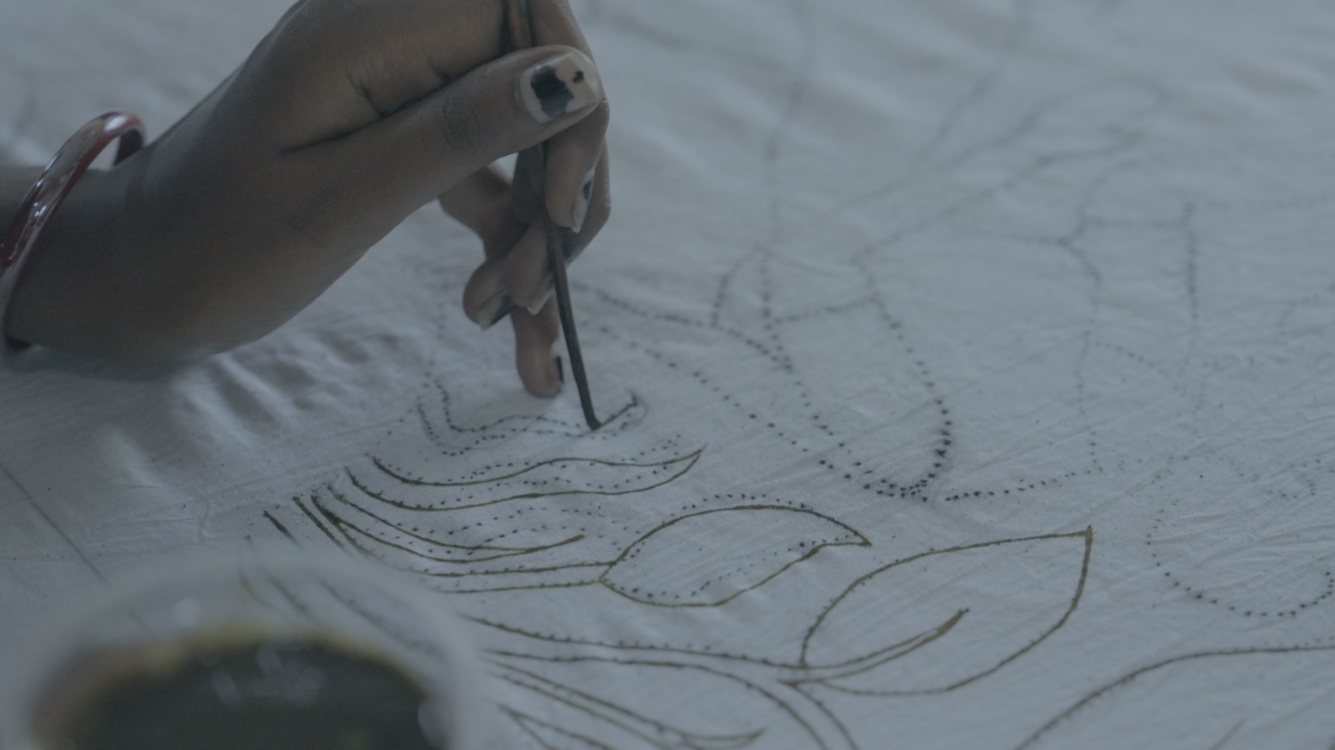 A kalam pen drawing a fine outline